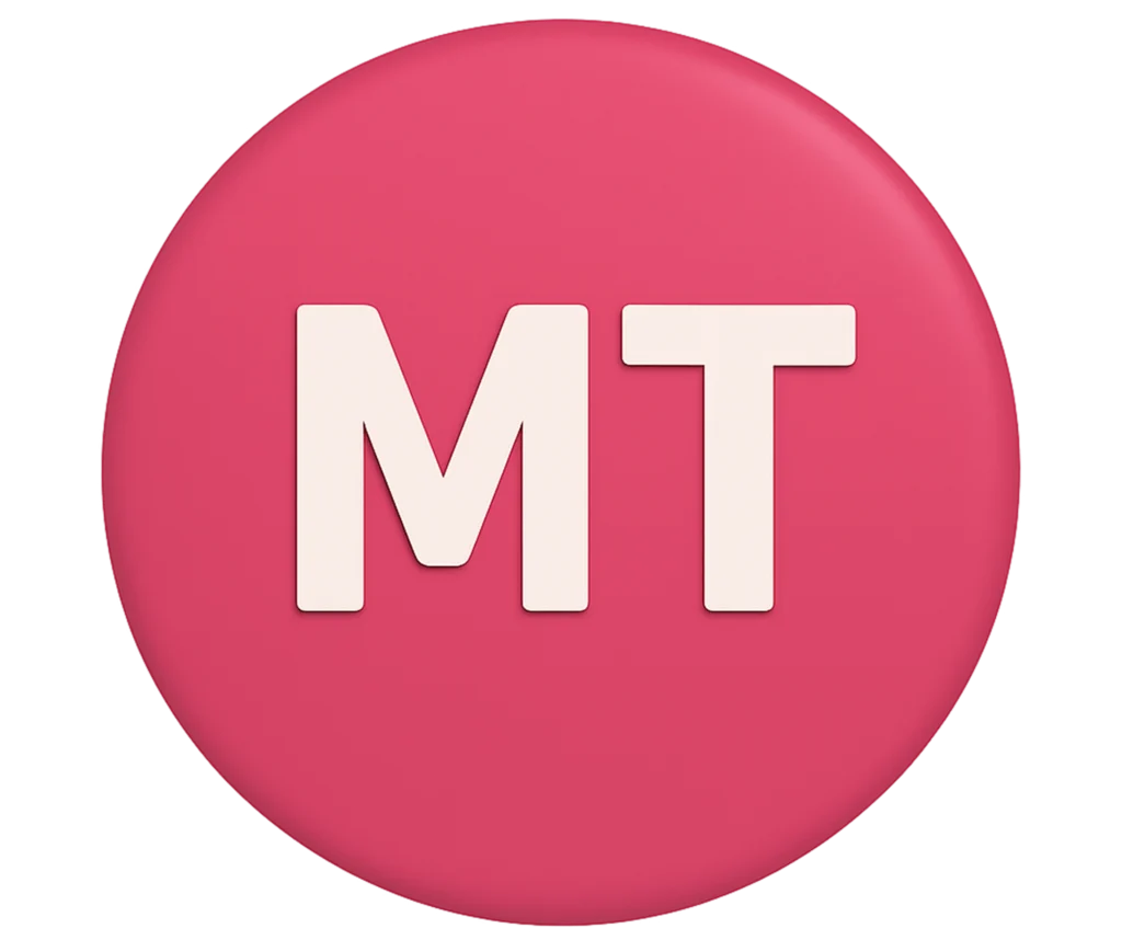 Ícone circular rosa com as letras MT em branco, representando Metaverso.