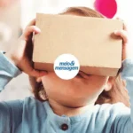 Criança usando cardboard de realidade virtual, imagem da reportagem do Meio & Mensagem sobre a Agência Casa Mais